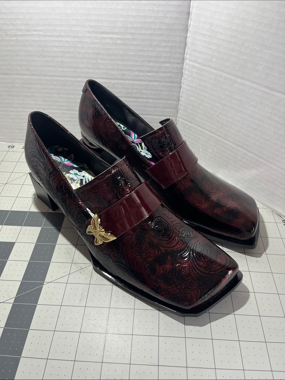 Burgundy Floral Embossed Loafers with Gold Butterfly Accent